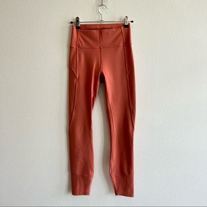 Lululemon In Movement leggings in coral. Size 4